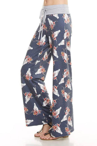 A french terry flower head cow skull print casual pants with adjustable drawstring waistline